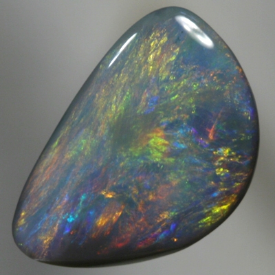 SOLID BLACK OPAL Golden fire, red, copper and green over blue purple